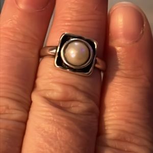 Size 7 925 stamped silver ring with opal round center and enamel black Square